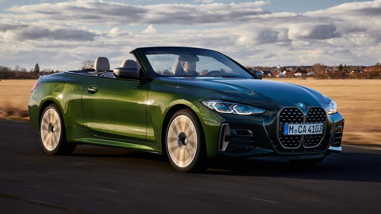 2022 BMW M440i convertible in green driving